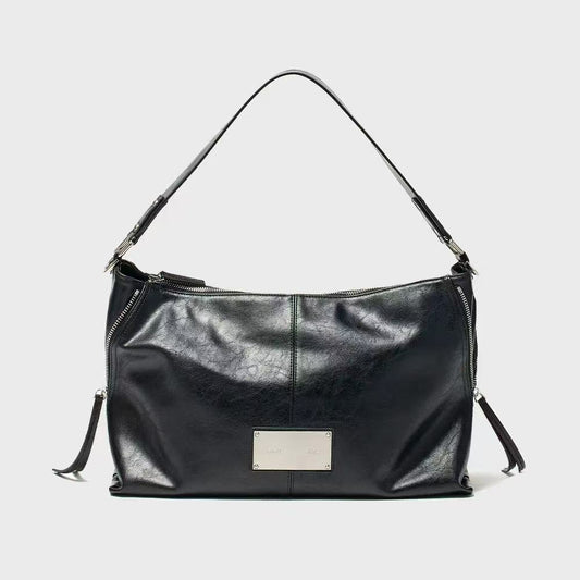MATIN KIM SIDE ZIPPER SHOULDER BAG IN BLACK (Preorder)