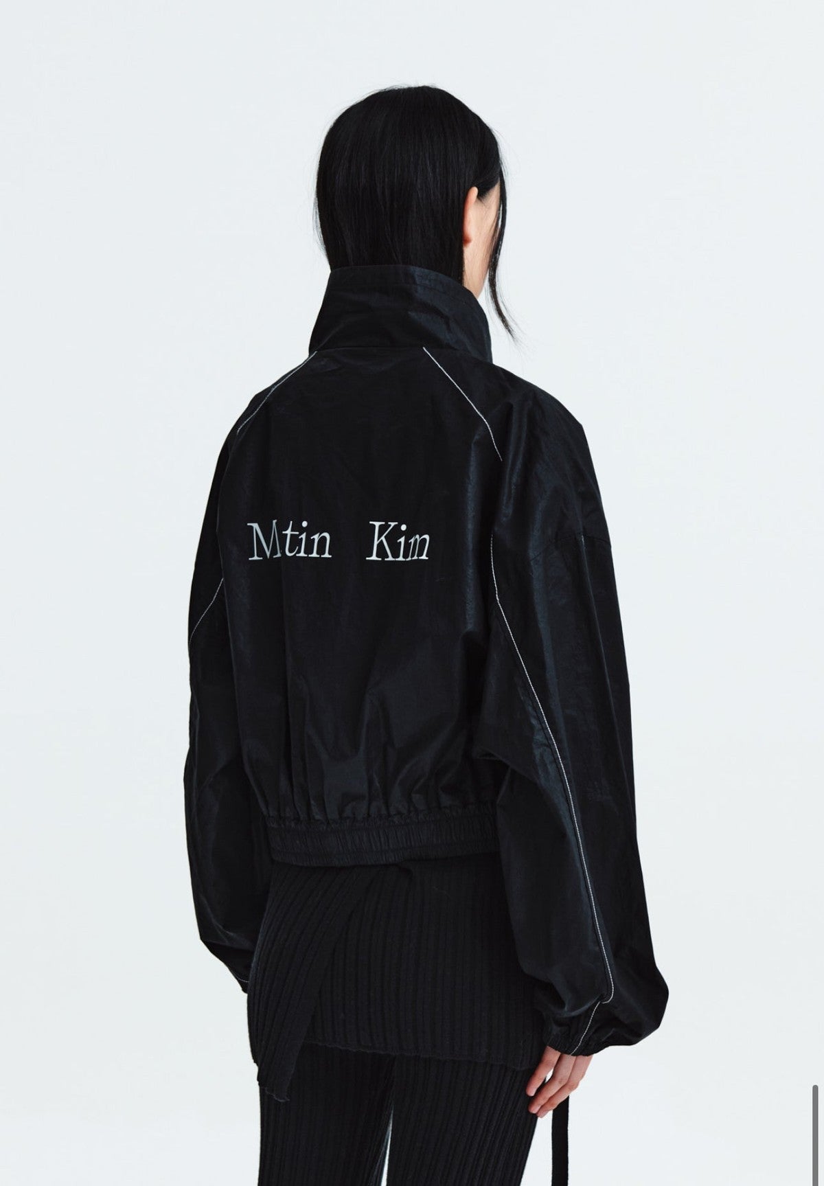 MATIN KIM MATIN COATING CROP BLOUSON IN BLACK (Instock)