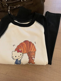 Kelly Designs Hello Kitty Croissant Graphic Raglan Tee – Black & Cream (Instock)