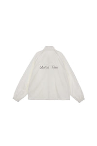 MATIN KIM LOGO COATING JUMPER IN IVORY (Instock)
