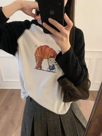 Kelly Designs Hello Kitty Croissant Graphic Raglan Tee – Black & Cream (Instock)